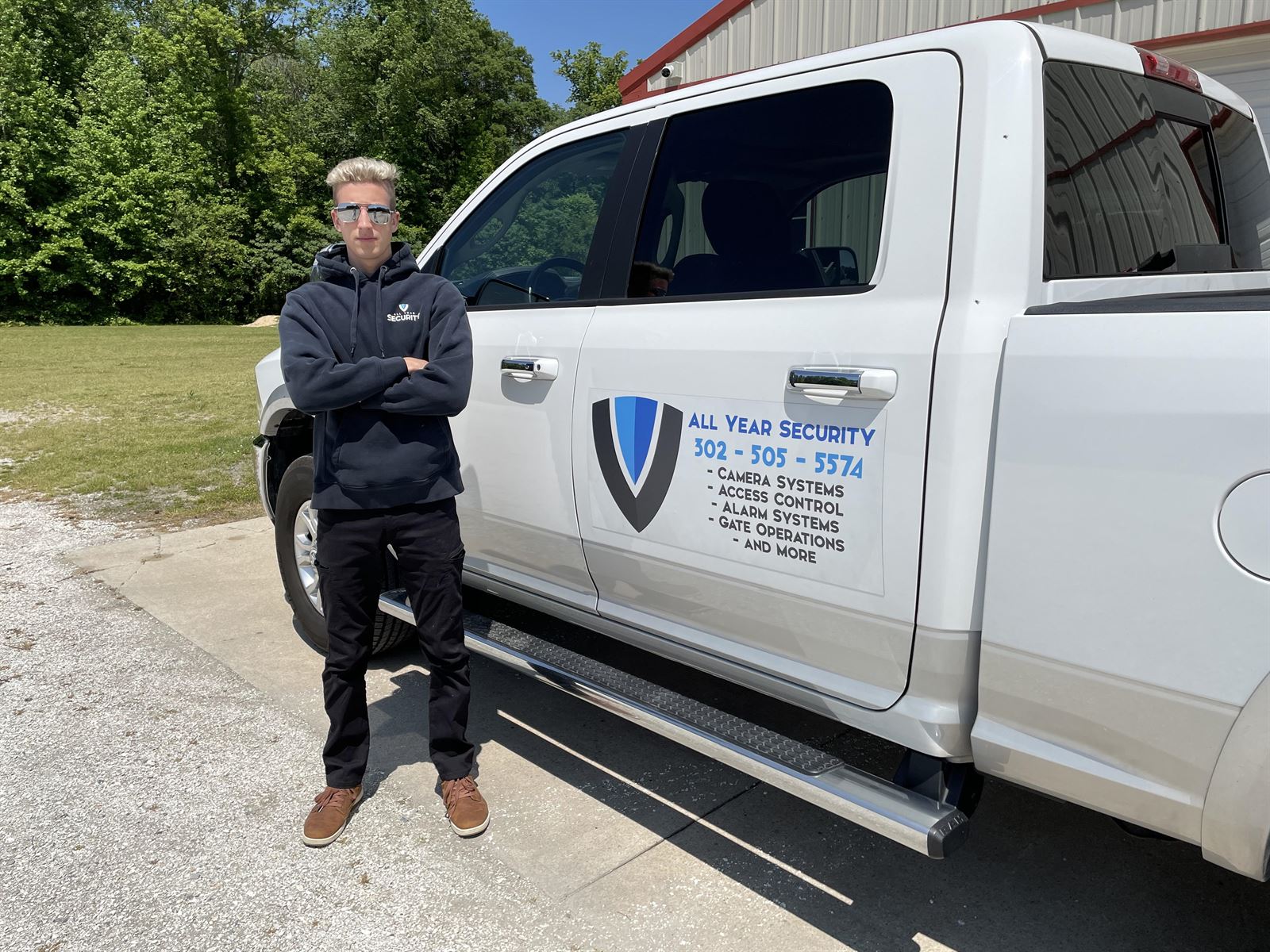 All Year Security technician on an installation job